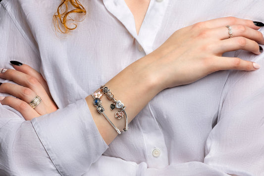 The Fascinating Journey of Charm Bracelets: From Ancient Talismans to Modern Fashion